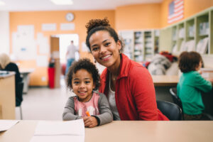 Young woman and a Little Girl Celebrating at a Martin Luther King Jr. Day Event